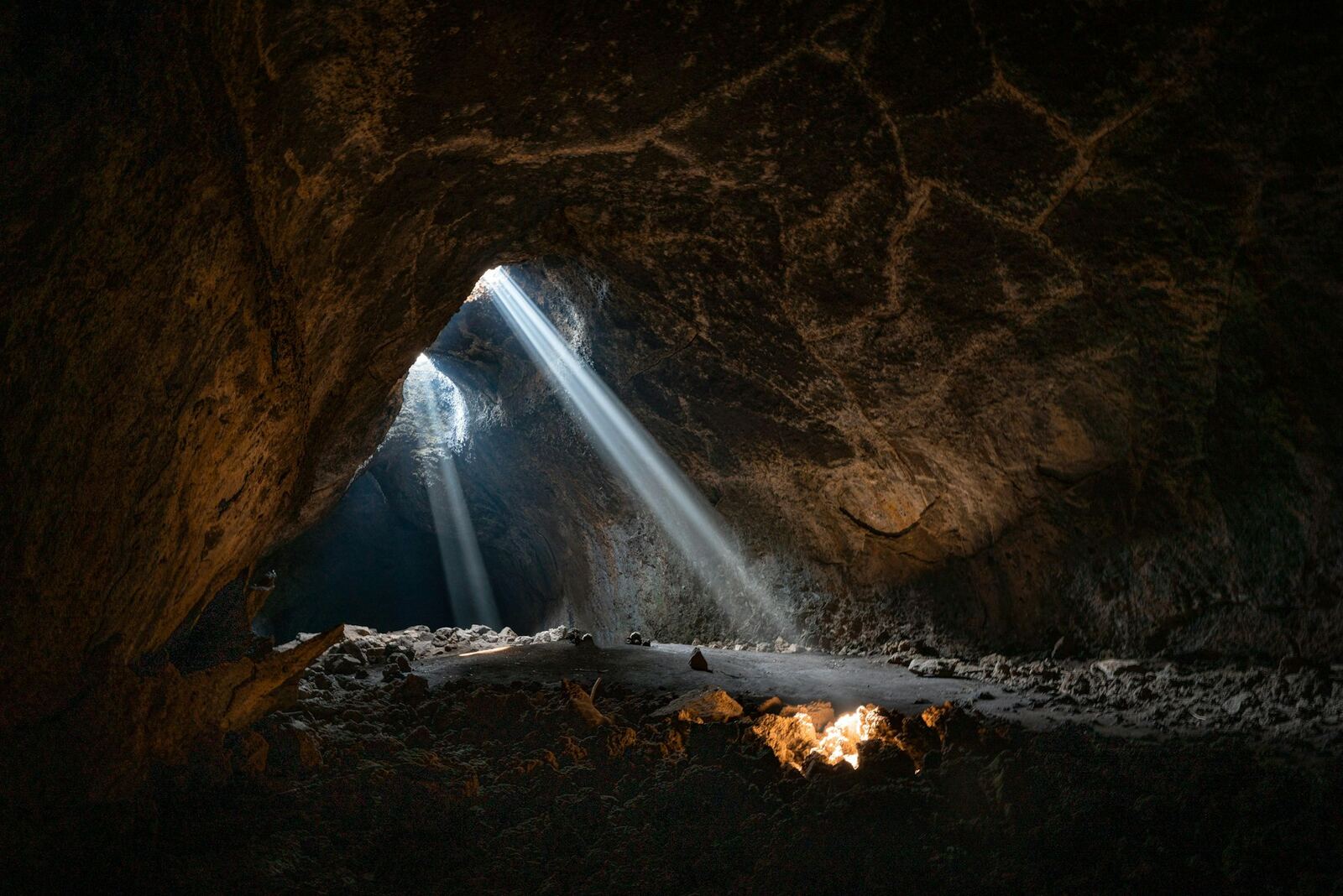 Sunlight shining into a large cave